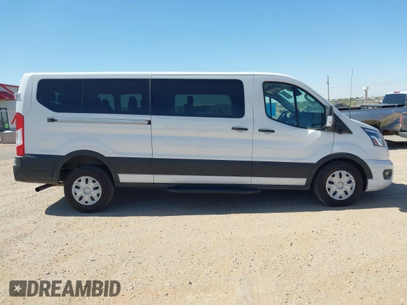 2023 Ford Transit Passenger XL with VIN 1FBAX2Y89PKA45043, listed as a IAAI auction lot 39253709 with 54,625 mi miles and . Bid and sale history available at DreamBid. Image 13.
