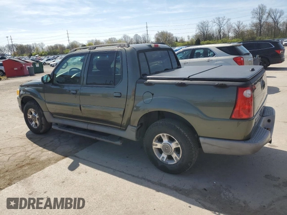 2003 Ford Explorer Sport Trac XLS with VIN 1FMZU77E43UB74698, listed as a Copart auction lot 54210645 with 207,678 mi miles and Salvage title. Bid and sale history available at DreamBid. Image 2.