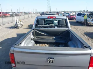2021 Ram 1500 Tradesman z VIN 1C6RR6FG6MS550891, wystawiony jako IAAI lot #42013131 z przebiegiem 100 229 mil mil oraz . Historia ofert i sprzedaży dostępna na DreamBid. Obrazek 17.