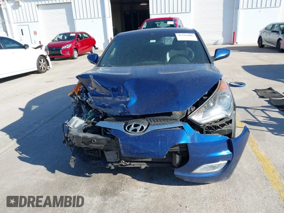 2016 Hyundai Veloster with VIN KMHTC6AD8GU302014, listed as a IAAI auction lot 41764406 with 102,893 mi miles. Bid and sale history available at carsss.com. Image 12.