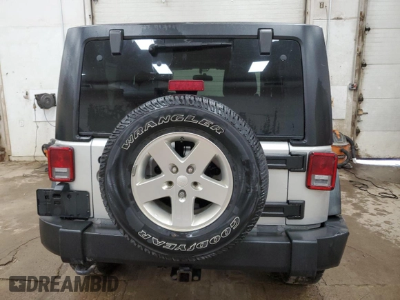 2012 Jeep Wrangler Sport with VIN 1C4AJWAGXCL133013, listed as a Copart auction lot 59788325 with 141,015 mi miles and Clean title. Bid and sale history available at DreamBid. Image 6.