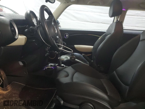 2012 MINI Hardtop with VIN WMWSU3C56CT543312, listed as a Copart auction lot 55786805 with 138,713 mi miles and Salvage title. Bid and sale history available at DreamBid. Image 7.
