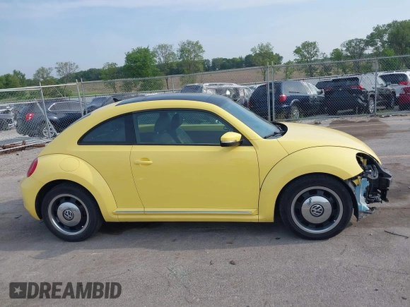 2013 Volkswagen Beetle with VIN 3VWHX7AT0DM603661, listed as a IAAI auction lot 42464030 with 95,159 mi miles and . Bid and sale history available at DreamBid. Image 14.