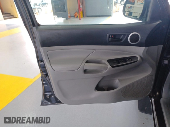 2014 Toyota Tacoma with VIN 3TMMU4FN8EM068633, listed as a IAAI auction lot 42727713 with 185,402 mi miles and . Bid and sale history available at DreamBid. Image 7.