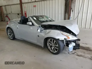 2014 Nissan 370Z Touring with VIN JN1AZ4FH0EM621207, listed as a Copart auction lot 50928485 with Not Provided miles and Salvage Title. Bid and sale history available at DreamBid. Image 4.