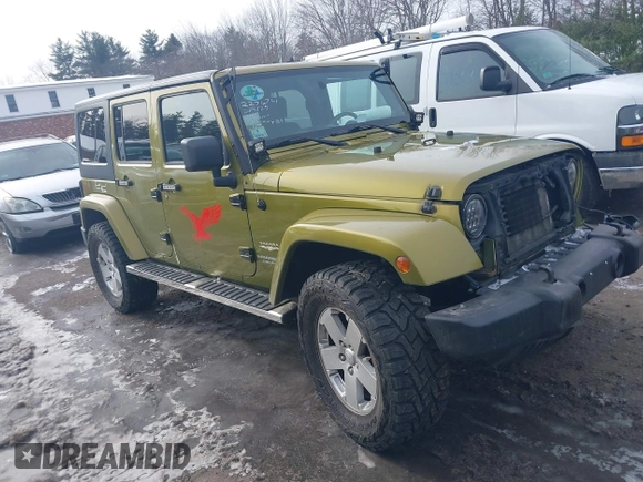 2007 Jeep Wrangler Unlimited Sahara z VIN 1J4GA59137L147257, wystawiony jako IAAI lot #41565673 z przebiegiem 187 982 mil mil oraz . Historia ofert i sprzedaży dostępna na DreamBid. Obrazek 1.