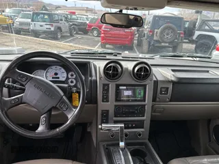 2003 Hummer H2 with VIN 5GRGN23UX3H124517, listed as a Copart auction lot 41650395 with 999,999 mi miles and Clean Title. Bid and sale history available at carsss.com. Image 9.