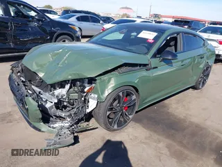 2023 Audi S5 Sportback Premium Plus z VIN WAUB4CF56PA007375, wystawiony jako IAAI lot #41630832 z przebiegiem 23 668 mil mil oraz . Historia ofert i sprzedaży dostępna na DreamBid. Obrazek 17.