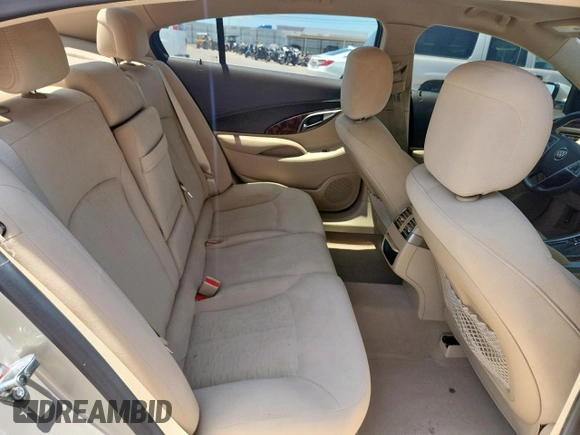 2013 Buick LaCrosse z VIN 1G4GA5E31DF322706, wystawiony jako Copart lot #61290365 z przebiegiem 26 304 mil mil oraz Szkoda całkowita • Salvage title. Historia ofert i sprzedaży dostępna na DreamBid. Obrazek 10.