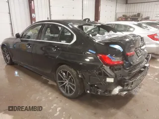 2019 BMW 3 Series 330i xDrive with VIN WBA5R7C56KAJ86102, listed as a IAAI auction lot 41368114 with 89,723 mi miles. Bid and sale history available at carsss.com. Image 3.