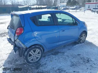 2014 Chevrolet Spark LT with VIN KL8CD6S93EC405672, listed as a IAAI auction lot 41398003 with 126,926 mi miles. Bid and sale history available at carsss.com. Image 4.