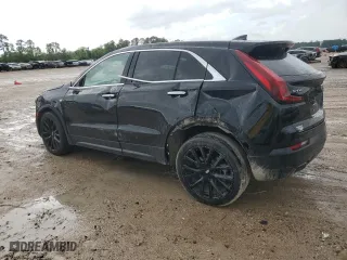 2023 Cadillac XT4 FWD Luxury with VIN 1GYAZAR45PF218684, listed as a Copart auction lot 54427565 with 74,920 mi miles and Salvage Title. Bid and sale history available at carsss.com. Image 2.