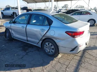 2023 Kia Rio LX with VIN 3KPA24AD1PE599290, listed as a IAAI auction lot 41023283 with 10,027 mi miles and . Bid and sale history available at DreamBid. Image 3.