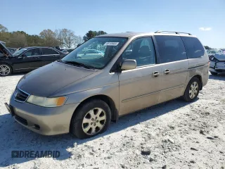 2004 Honda Odyssey EX-L with VIN 5FNRL18974B085790, listed as a Copart auction lot 49159665 with 179,207 mi miles and Salvage Title. Bid and sale history available at DreamBid. Image 1.
