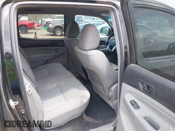 2015 Toyota Tacoma PreRunner with VIN 3TMJU4GN5FM189557, listed as a IAAI auction lot 42387542 with 189,188 mi miles and . Bid and sale history available at DreamBid. Image 8.