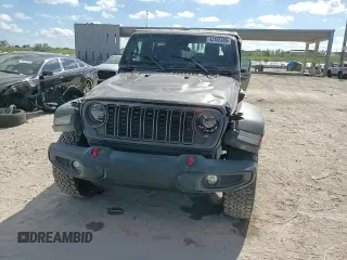 2024 Jeep Wrangler Rubicon z VIN 1C4PJXFG6RW261748, wystawiony jako Copart lot #44166485 z przebiegiem 7 911 mil mil oraz Szkoda całkowita • Salvage title. Historia ofert i sprzedaży dostępna na DreamBid. Obrazek 13.