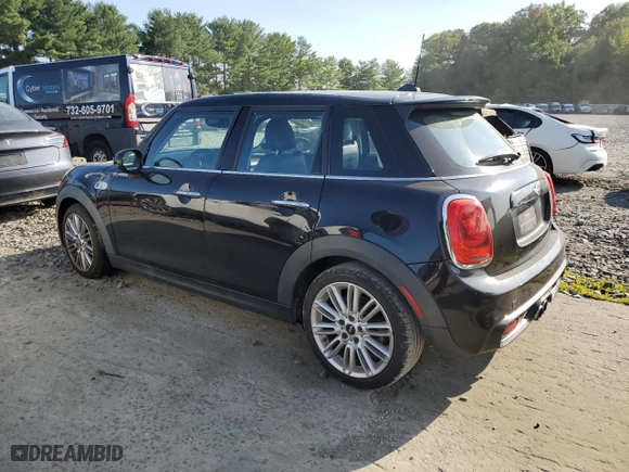 2018 MINI Hardtop 4 Door Cooper S with VIN WMWXU3C58J2F51214, listed as a Copart auction lot 70021324 with 92851 miles and Salvage Title. Bid and sale history available at carsss.com. Image 2.