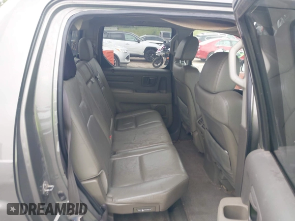 2007 Honda Ridgeline RTL with VIN 2HJYK16517H513832, listed as a IAAI auction lot 42626411 with 209,171 mi miles and . Bid and sale history available at DreamBid. Image 8.
