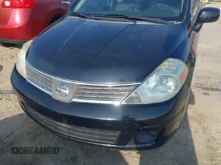 2007 Nissan Versa 1.8 S with VIN 3N1BC13E97L359537, listed as a IAAI auction lot 42127935 with 128,891 mi miles. Bid and sale history available at carsss.com. Image 6.