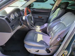 2005 Chrysler 300 with VIN 2C3AA63H35H659798, listed as a Copart auction lot 50322065 with 153,944 mi miles and Salvage Title. Bid and sale history available at carsss.com. Image 7.