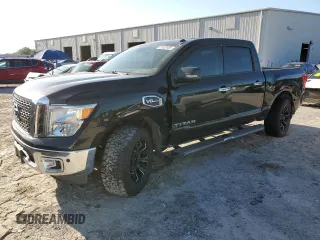 2017 Nissan Titan Platinum Reserve z VIN 1N6AA1E65HN536197, wystawiony jako Copart lot #57022465 z przebiegiem 93 579 mil mil oraz Szkoda całkowita • Salvage title. Historia ofert i sprzedaży dostępna na DreamBid. Obrazek 1.