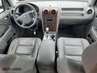 2007 Ford Freestyle SEL with VIN 1FMDK02197GA24604, listed as a Copart auction lot 74915664 with 243,960 mi miles and Salvage Title. Bid and sale history available at carsss.com. Image 8.