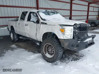 2015 Ford Super Duty F-250 SRW Lariat with VIN 1FT7W2BT9FEC51353, listed as a IAAI auction lot 41565239 with 140,000 mi miles. Bid and sale history available at carsss.com. Image 1.