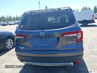 2021 Honda Pilot EX-L with VIN 5FNYF6H59MB016354, listed as a IAAI auction lot 42108020 with 61,436 mi miles and . Bid and sale history available at DreamBid. Image 17.