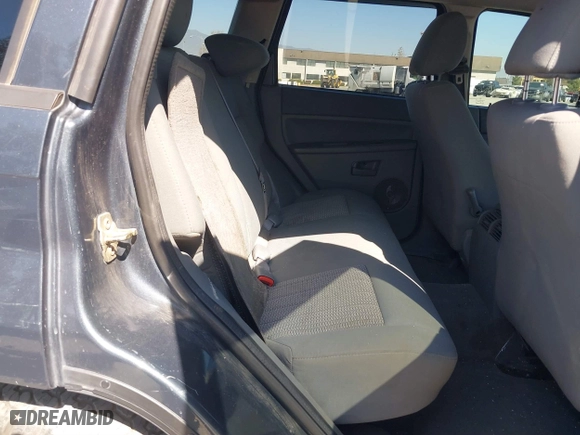 2007 Jeep Grand Cherokee Laredo with VIN 1J8HR48PX7C660601, listed as a IAAI auction lot 41652509 with 131,556 mi miles. Bid and sale history available at carsss.com. Image 8.