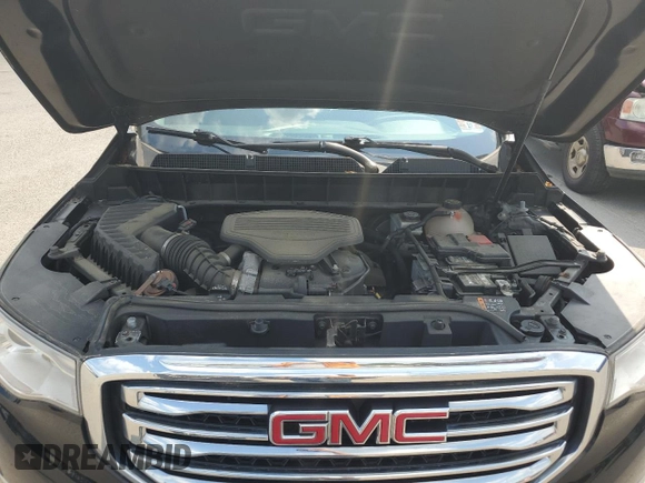 2018 GMC Acadia SLE with VIN 1GKKNLLS7JZ144042, listed as a Copart auction lot 57464704 with 123,204 mi miles and Salvage Title. Bid and sale history available at DreamBid. Image 12.