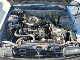 1987 Toyota Corolla с VIN JT2AE82E4H3494699, выставлен на аукционе Copart как лот 66815714 с пробегом 145 679 миль миль и Списание • Salvage title. История ставок и продаж доступна на DreamBid. Изображение 11.