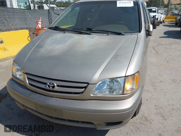2002 Toyota Sienna LE with VIN 4T3ZF13C72U473555, listed as a IAAI auction lot 42426344 with 330,911 mi miles and . Bid and sale history available at DreamBid. Image 6.