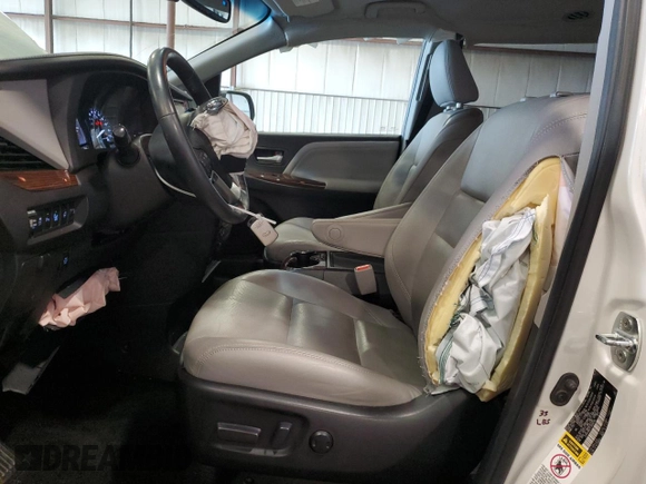 2015 Toyota Sienna XLE with VIN 5TDYK3DC4FS688299, listed as a Copart auction lot 61793155 with 57,197 mi miles and Salvage title. Bid and sale history available at DreamBid. Image 7.