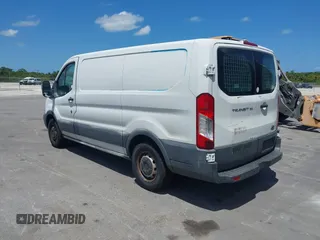 2015 Ford Transit Cargo with VIN 1FTNE1YM7FKA95206, listed as a IAAI auction lot 42083733 with 195,306 mi miles. Bid and sale history available at carsss.com. Image 3.