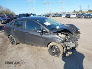 2015 Ford Fiesta SE with VIN 3FADP4BJ1FM128656, listed as a IAAI auction lot 41987997 with 106,588 mi miles. Bid and sale history available at carsss.com. Image 12.
