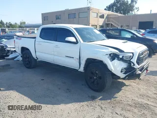 2022 Toyota Tacoma SR with VIN 3TMCZ5AN1NM470911, listed as a IAAI auction lot 42440530 with 40,623 mi miles and . Bid and sale history available at DreamBid. Image 1.