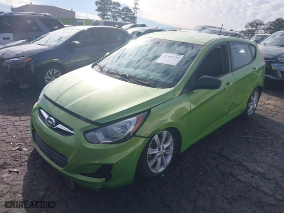 2012 Hyundai Accent SE with VIN KMHCU5AE2CU026701, listed as a IAAI auction lot 41303728 with 66,855 mi miles. Bid and sale history available at carsss.com. Image 2.