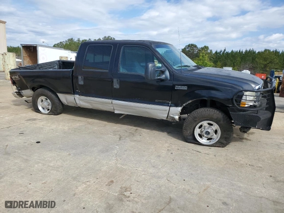 2002 Ford Super Duty F-250 XL with VIN 1FTNW21F92EA03004, listed as a Copart auction lot 49316115 with 209,520 mi miles and Salvage Title. Bid and sale history available at carsss.com. Image 4.