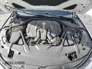 2016 BMW 7 Series 750i xDrive z VIN WBA7F2C50GG421120, wystawiony jako Copart lot #75668694 z przebiegiem 83 178 mil mil oraz Szkoda całkowita • Salvage title. Historia ofert i sprzedaży dostępna na DreamBid. Obrazek 11.
