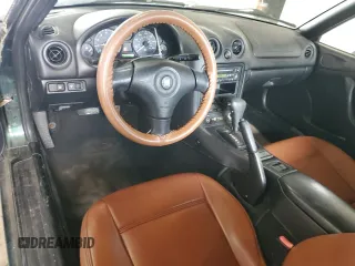 1999 Mazda MX-5 Miata z VIN JM1NB353XX0111850, wystawiony jako Copart lot #53076805 z przebiegiem 128 707 mil mil oraz Szkoda całkowita • Salvage title. Historia ofert i sprzedaży dostępna na DreamBid. Obrazek 8.