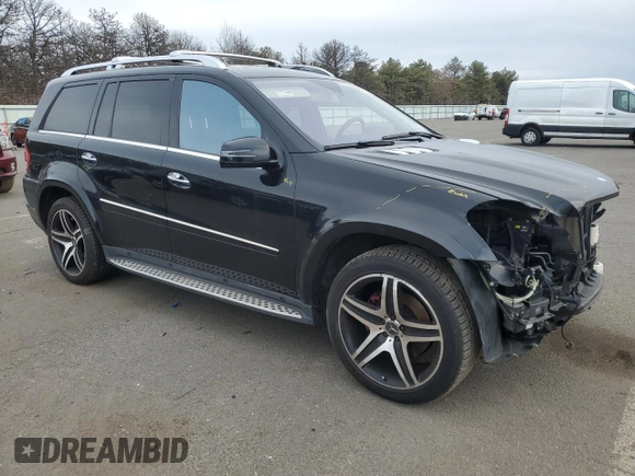 2012 Mercedes-Benz GL-Class GL 550 with VIN 4JGBF8GE7CA784498, listed as a Copart auction lot 45572265 with 114,537 mi miles and Salvage Title. Bid and sale history available at carsss.com. Image 4.