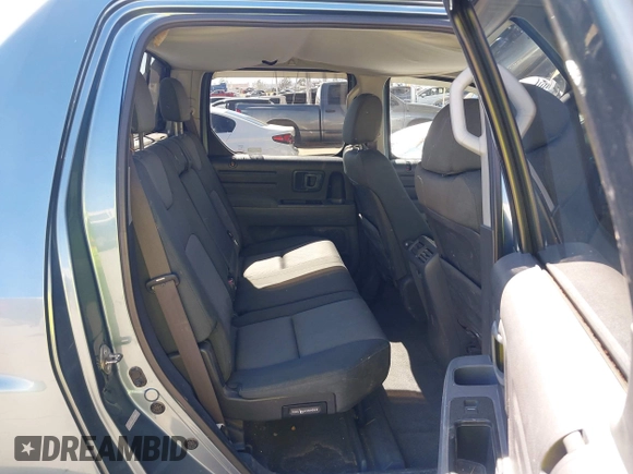2006 Honda Ridgeline RTS z VIN 2HJYK16446H557197, wystawiony jako IAAI lot #42227895 z przebiegiem 285 603 mil mil oraz . Historia ofert i sprzedaży dostępna na DreamBid. Obrazek 8.