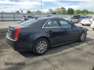2011 Cadillac CTS Luxury z VIN 1G6DE5EY4B0102325, wystawiony jako Copart lot #57691775 z przebiegiem 157 711 mil mil oraz Szkoda całkowita • Salvage title. Historia ofert i sprzedaży dostępna na DreamBid. Obrazek 3.