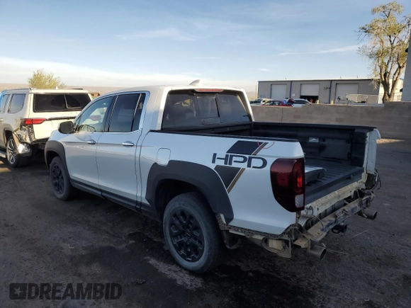 2022 Honda Ridgeline RTL-E with VIN 5FPYK3F77NB031233, listed as a Copart auction lot 49735525 with 71,450 mi miles and Salvage Title. Bid and sale history available at DreamBid. Image 2.