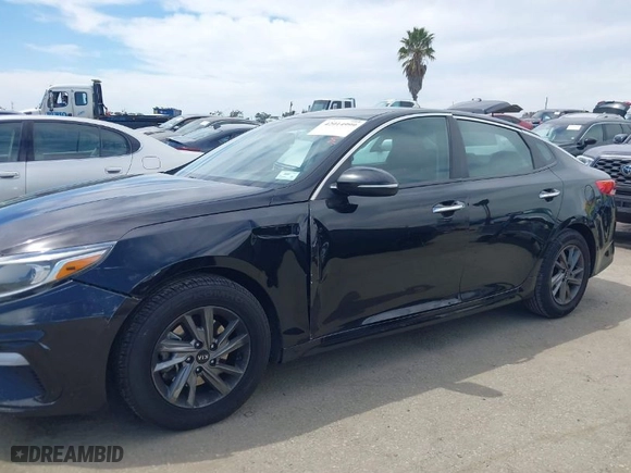 2019 Kia Optima S with VIN 5XXGT4L34KG296953, listed as a IAAI auction lot 42014999 with 64,968 mi miles. Bid and sale history available at carsss.com. Image 14.