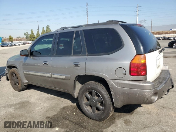 2005 GMC Envoy SLT with VIN 1GKDS13S952382088, listed as a Copart auction lot 64765154 with 177,333 mi miles and Salvage Title. Bid and sale history available at carsss.com. Image 2.