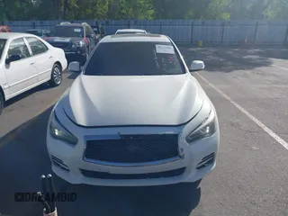 2015 Infiniti Q50 Premium z VIN JN1BV7ARXFM416349, wystawiony jako IAAI lot #42225088 z przebiegiem 194 127 mil mil oraz . Historia ofert i sprzedaży dostępna na DreamBid. Obrazek 12.