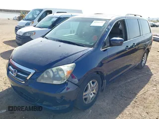 2005 Honda Odyssey EX-L with VIN 5FNRL38755B007567, listed as a IAAI auction lot 41952348 with 183,514 mi miles and . Bid and sale history available at carsss.com. Image 2.