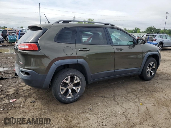 2015 Jeep Cherokee Trailhawk with VIN 1C4PJMBSXFW545534, listed as a Copart auction lot 62236885 with 148,448 mi miles and Clean title. Bid and sale history available at DreamBid. Image 3.