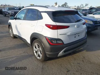 2023 Hyundai Kona SEL with VIN KM8K3CAB8PU055554, listed as a IAAI auction lot 41828652 with 11,323 mi miles and . Bid and sale history available at DreamBid. Image 3.